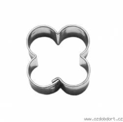 Mini-Ausstechform in Blütenform aus vernickertem Blech.