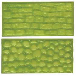 Strukturierte Steinunterlage Wand und Kieselsteine